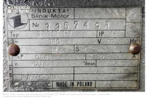 Tabliczka znamionowa trójfazowego silnika indukcyjnego Indukta. Metalowa, oryginalna tabliczka znamionowa silnika marki Indukta o mocy 11 kW (typ Sf 160 M-4) wyprodukowanego w Polsce. Odczytanie parametrów takich jak prąd znamionowy (22,5 A) czy napięcie (380 V) jest niezbędne, aby wiedzieć, jak ustawić softstart pod konkretny silnik elektryczny.