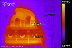Przegrzanie zacisku aparatu elektrycznego widoczne w badaniu termowizyjnym Termowizja przegrzanego zacisku aparatu elektrycznego wskazująca temperaturę prawie 100 stopni Celsjusza